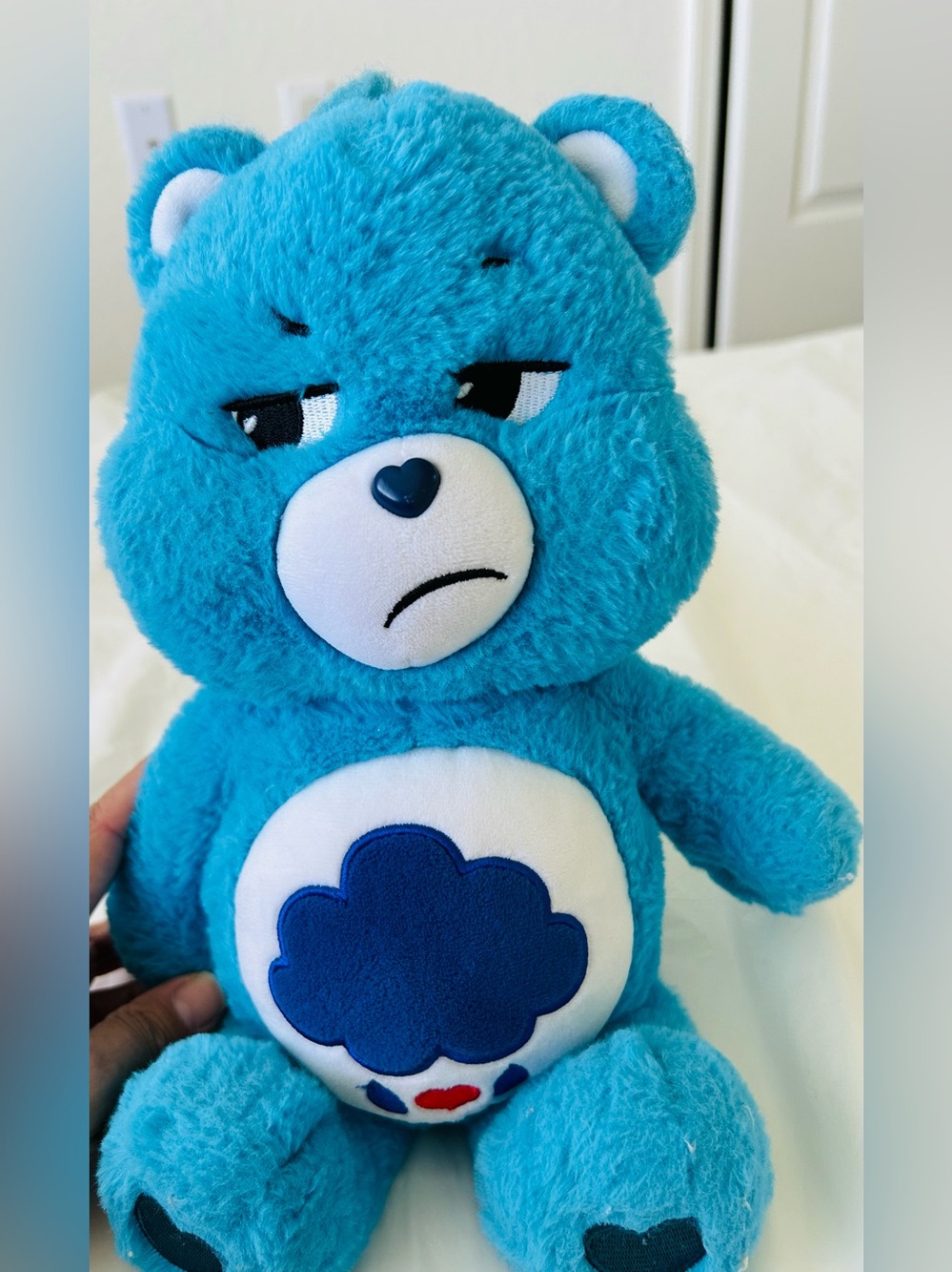 Care Bears Blue Grumpy Plush with Cloud Belly Badge